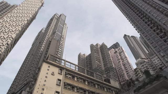 View from the street on big skyscrapers inside Hongkong City