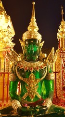 green sculpture in thailand temple