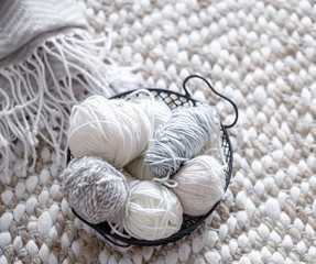 Fototapeta na wymiar Different yarn for knitting in pastel colors.