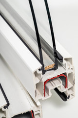 A cross section of wood effect Double glazing cut away to show the inner profile and construction quality