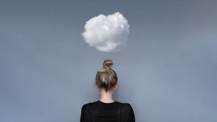 Young girl simple hairstyle back view with cloud above her head. Depression, loneliness and quarantine concept. Fashion model, trendy woman. Mental health metaphor concept