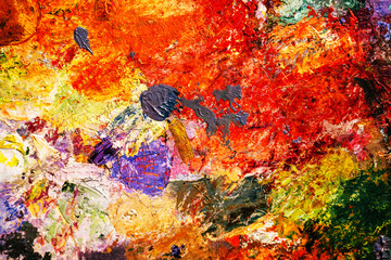 Fine art and oil paints on a palette.