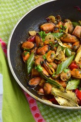 Oseng Kerang Saus Tiram, Indonesian food. Stir-fried mussels with oyster sauce, soy sauce, lemongrass, bayleaf, ginger, garlic and chili.