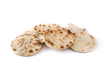 Handmade matzah for Jewish Passover isolated on white background