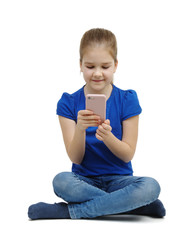 little girl looking at mobile phone