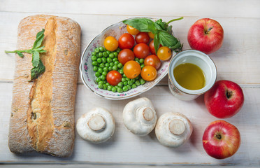 Vegan diet : bread Ciabatta  , mushrooms, cherry tomatoes and aplles