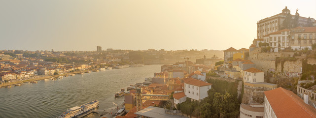 Beautiful panoramic view of the old city of Porto and the Duoro River at sunset in backlight, Portugal.