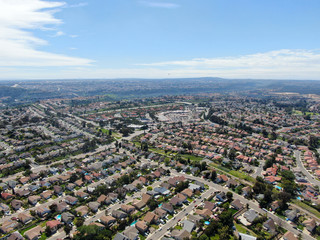 Obraz na płótnie Canvas Aerial view of upper middle class neighborhood with residential subdivision houses during sunny day in San Diego, California, USA.