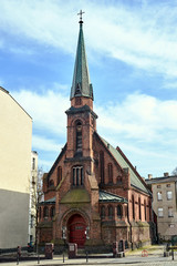 Fototapeta na wymiar A historic, neo-Gothic Evangelical church in the city of Poznan