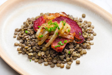 smoked meat with lentils and onion