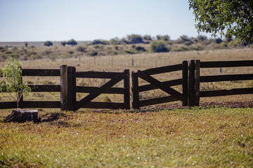 old wooden fence in field