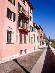 Old mediterranean houses in Verona, waterside