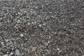 Pebble beach on the Black Sea in Sochi. Small and larger stones.