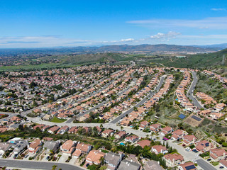 Obraz na płótnie Canvas Aerial view of upper middle class neighborhood with residential subdivision houses during sunny day in San Diego, California, USA.