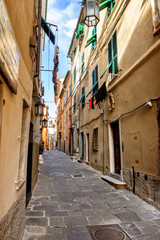 Fototapeta na wymiar Italian streets, main street of Portovenere in Cinque Terre National Park