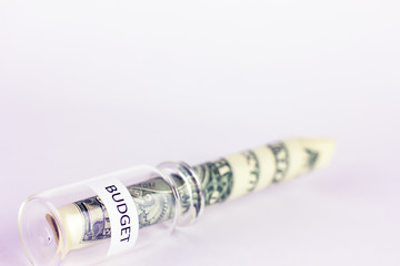 The collapse of a small one-dollar budget