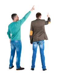 Back view of two man in sweater pointing.