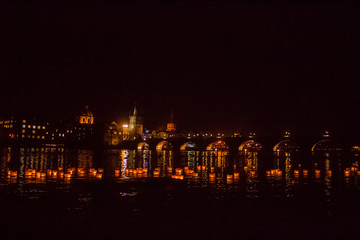 Fototapeta na wymiar Night Prague. A view of the river, and the Charles bridge.