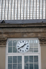 Fototapeta na wymiar old clock on building