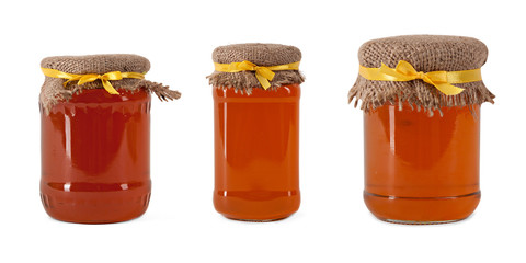 Three jar of honey on white background