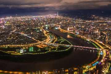 Fototapeta na wymiar Taipei City Aerial View - Asia business concept image, panoramic modern cityscape building bird’s eye view under at night, shot in Taipei, Taiwan.