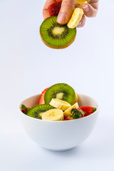 Recipe of a fruit salad with kiwis, strawberries, bananas
