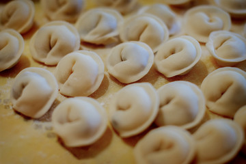 rows of freshly cooked home-made dumplings