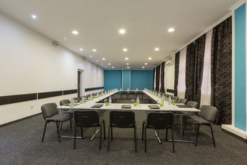 Interior of a conference room in hotel ready for a meeting