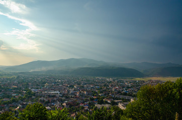 Epic panorama of a small town locating in a valley among the mountains