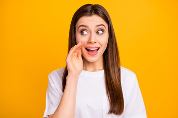 Photo of chatterbox pretty lady long hairstyle say tell news arm near mouth look sly side empty...