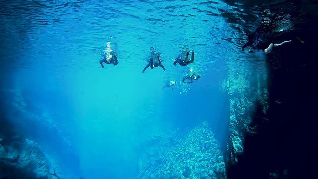 Divers in crystalline waters in Bonito in the state of Mato Grosso do Sul