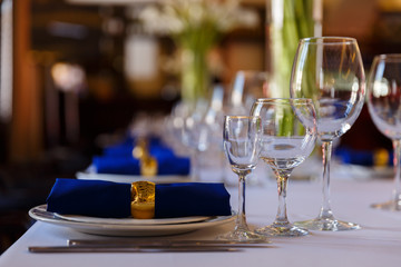 Wine glasses and champagne flutes on table, Wedding decor. Selective focus
