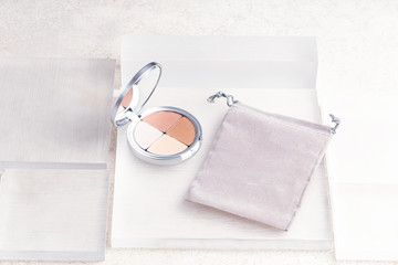 Beauty routine. Makeup palettes with blushes and powder. Minimalist beauty flat lay. Beauty palettes with mirrors. Make up products in minimalist palettes. Pastel blush and powder. Beige, pink colors.