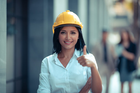 beautiful woman civil engineer close up portrait on field site