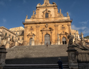 Fototapeta na wymiar Modica cityscape. View to Historical Buildings. Sicily, Italy.