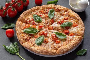 Pizza Margarita with sweet pepper. Still-life.