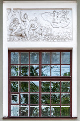 Window with a bas-relief.