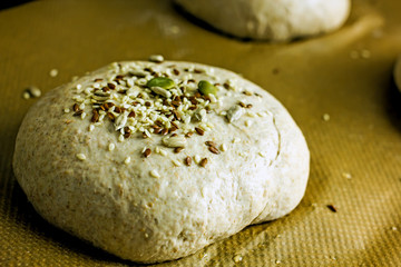 Yeast-free bread dough formed into baking loaves on a baking sheet