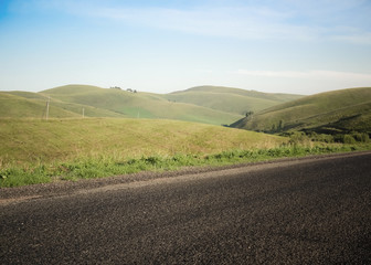 Empty Road and Nature of countryside with green hills