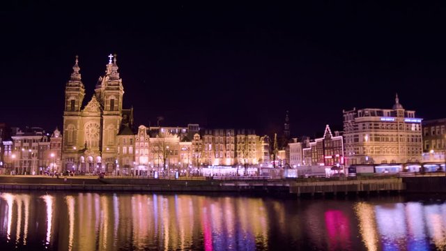 Super smooth hyperlapse of Amsterdam central with colorfoul reflection in the water 4K