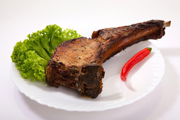 Appetizing pork rib with chilly isolated on white background