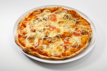 Flatlay of Italian pizza on wooden background. Rustic homemade pizzas with salami, bacon,  cheese, eggs and raw vegetables on shabby wooden background. Healthy vegetarian fungi pizza