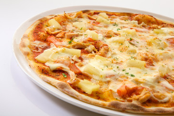 Flatlay of Italian pizza on wooden background. Rustic homemade pizzas with salami, bacon,  cheese, eggs and raw vegetables on shabby wooden background. Healthy vegetarian fungi pizza