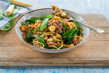 Pork noodle stir-fry with vegetables