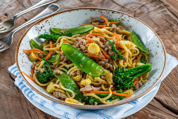Pork noodle stir-fry with vegetables