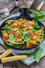 Pork noodle stir-fry with vegetables
