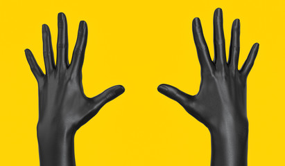Obraz premium Pair of grabbing hands isolated on yellow, black open palm gesture. 3d rendering. Art creative communication concept banner.