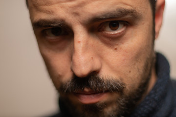 portrait of a man with worried expression