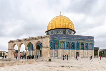 The Dome of the Rock mosque and Canyors - stone arches are on the Temple Mount in the Old Town of Jerusalem in Israel