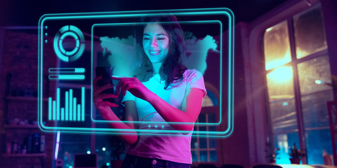 Woman using interface modern technology and digital layer effect as economics learning concept. Analyzing situation with world's finance position while crisis and pandemic, business strategy.